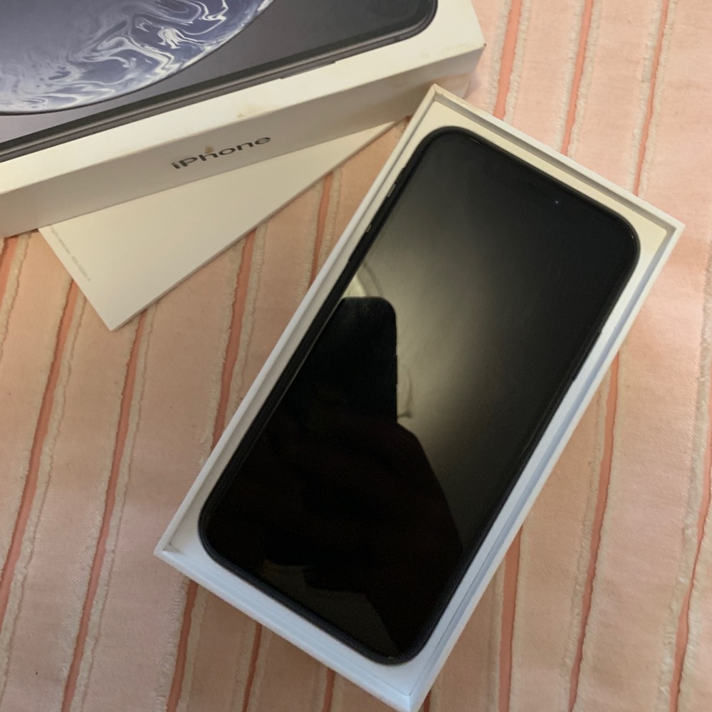 Unlocked brand new iPhone XR black 128 gb.
